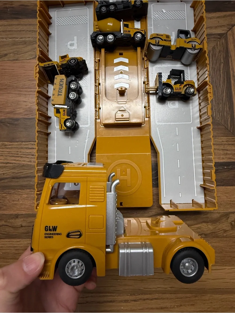 Toy Semi Truck and Trailer filled with 6 Construction Trucks